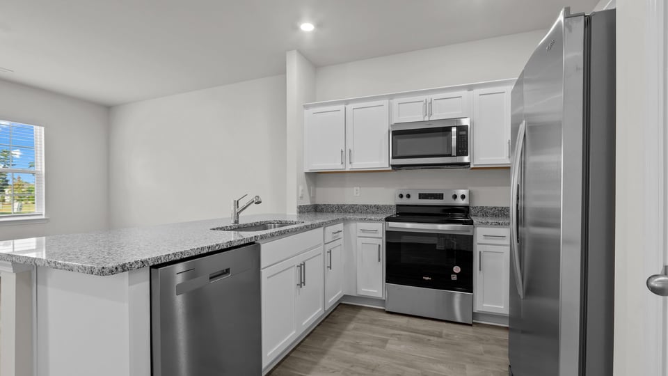 Kitchen with stainless-steel appliances