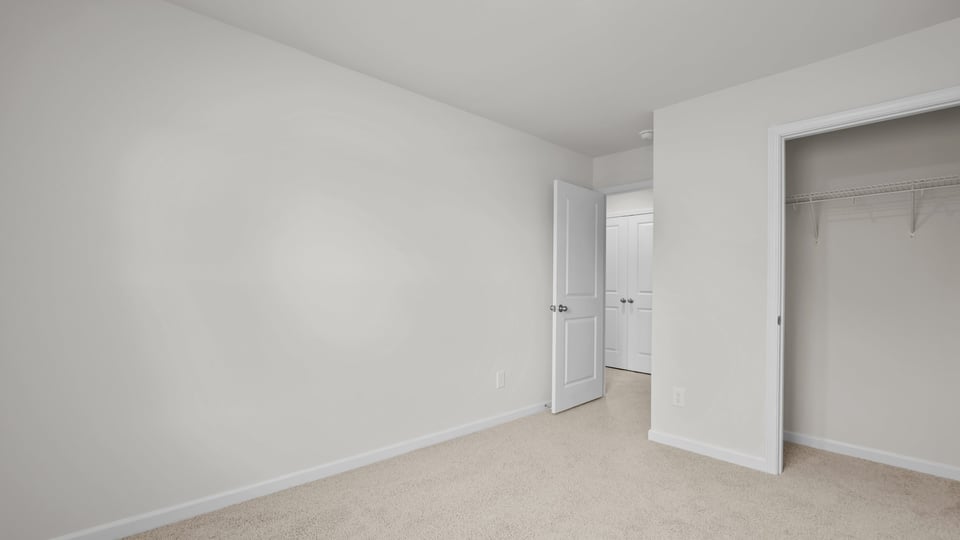 Bedroom with carpet flooring