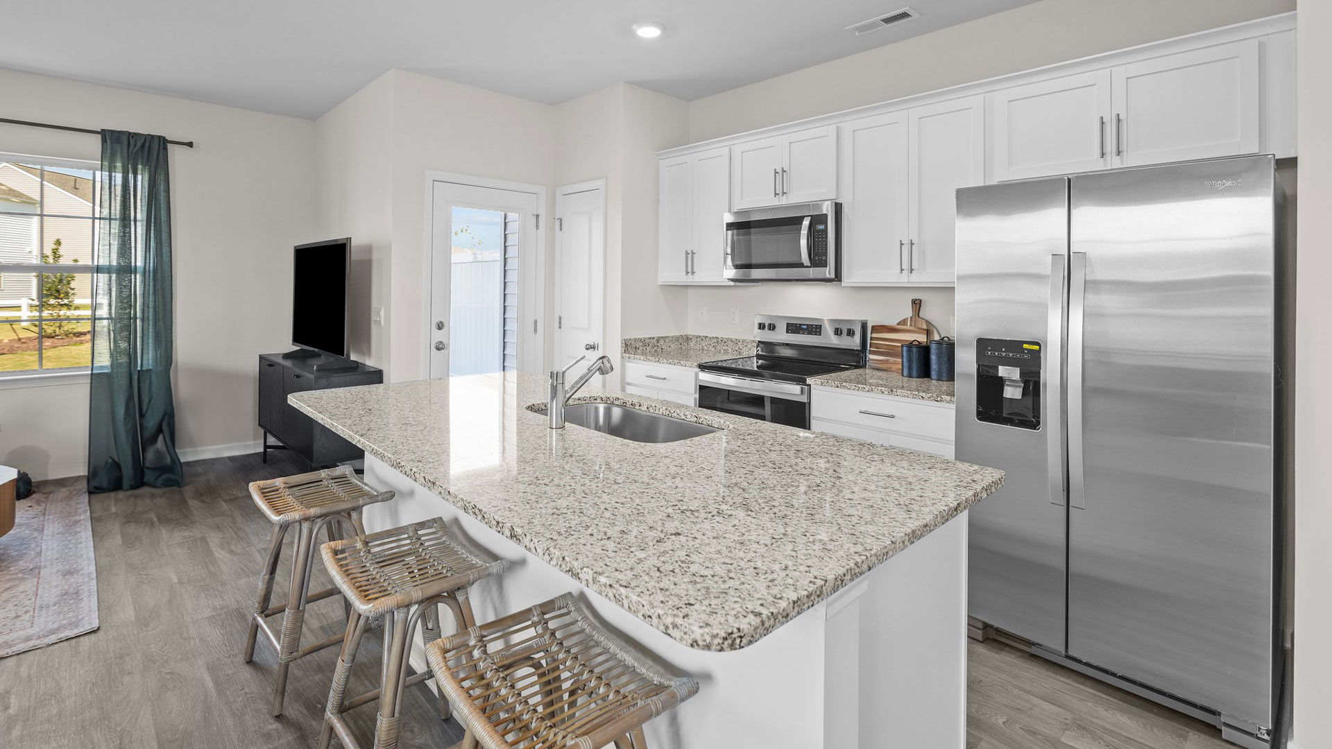 Kitchen area with granite counters