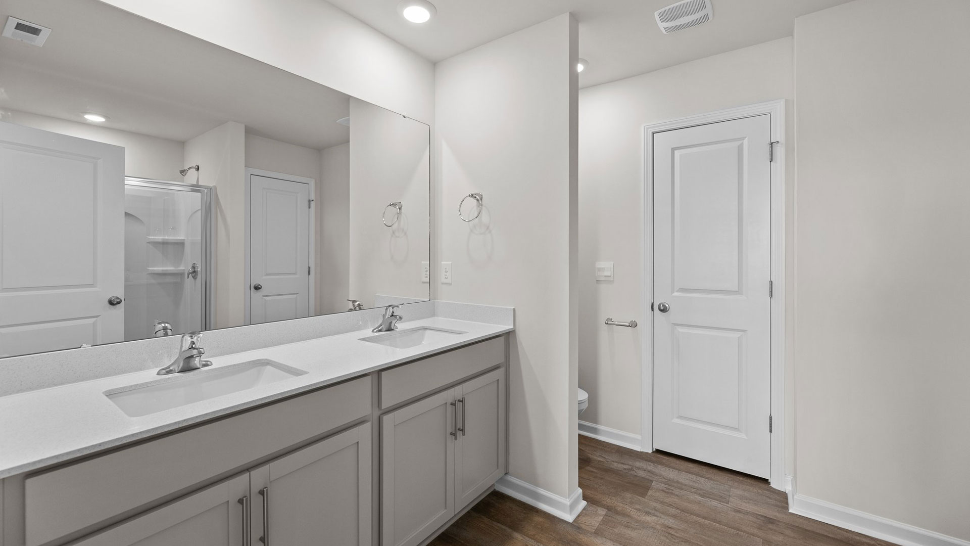 Bathroom with white cabinets