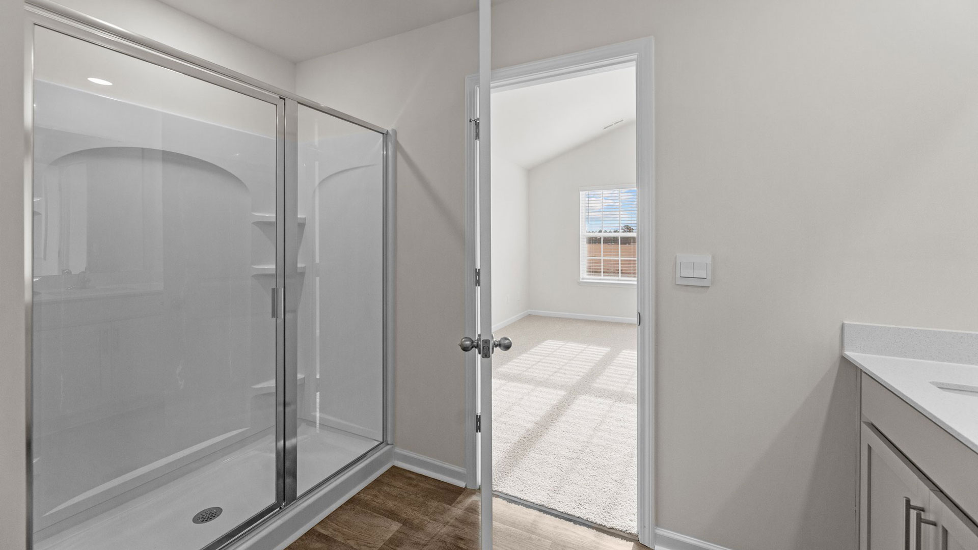 Bathroom with white cabinets