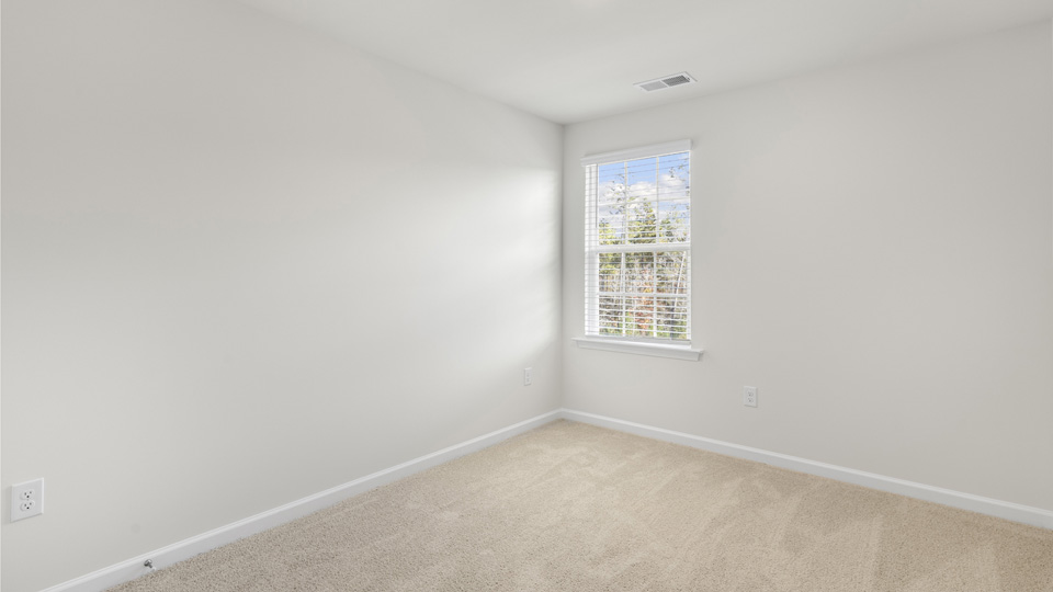 Bedroom with carpet