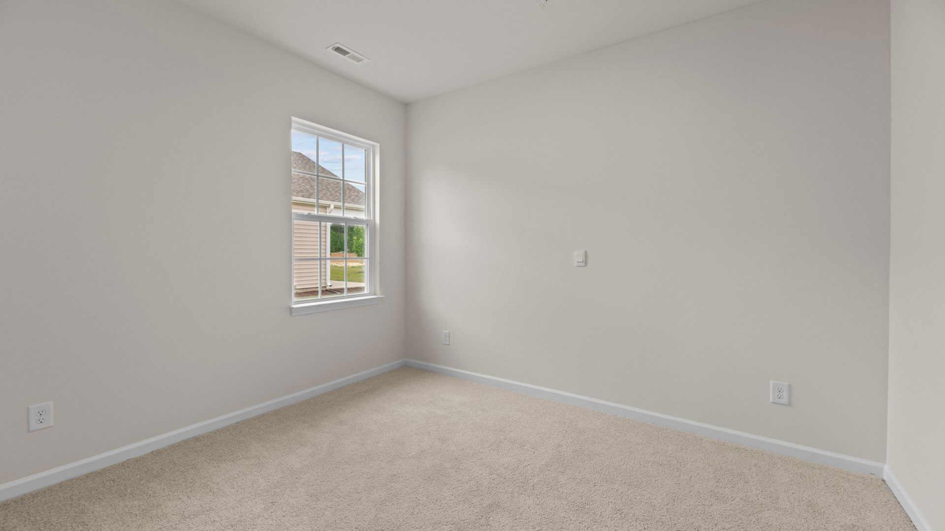 Bedroom with carpet flooring