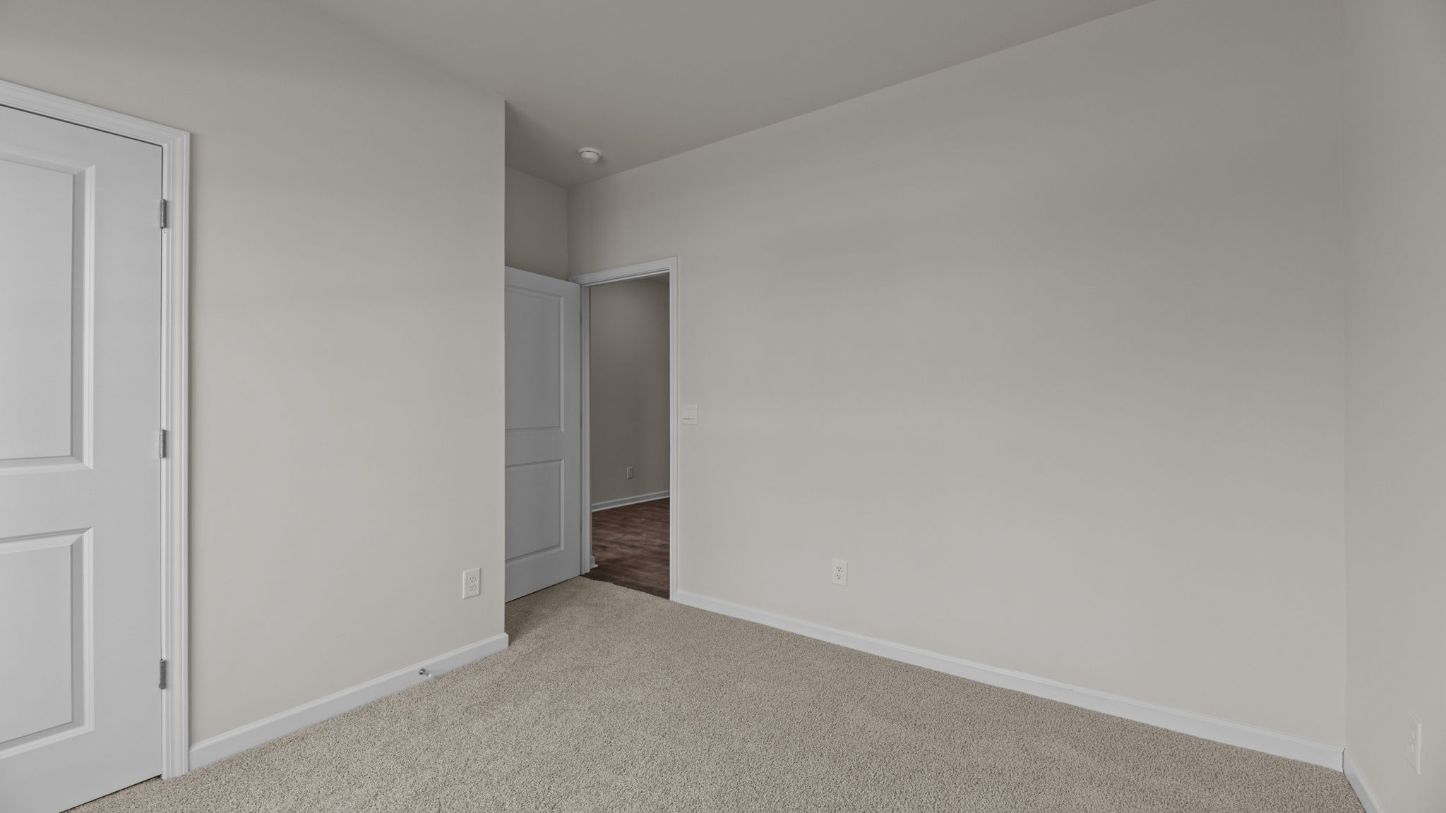 Bedroom with carpet flooring