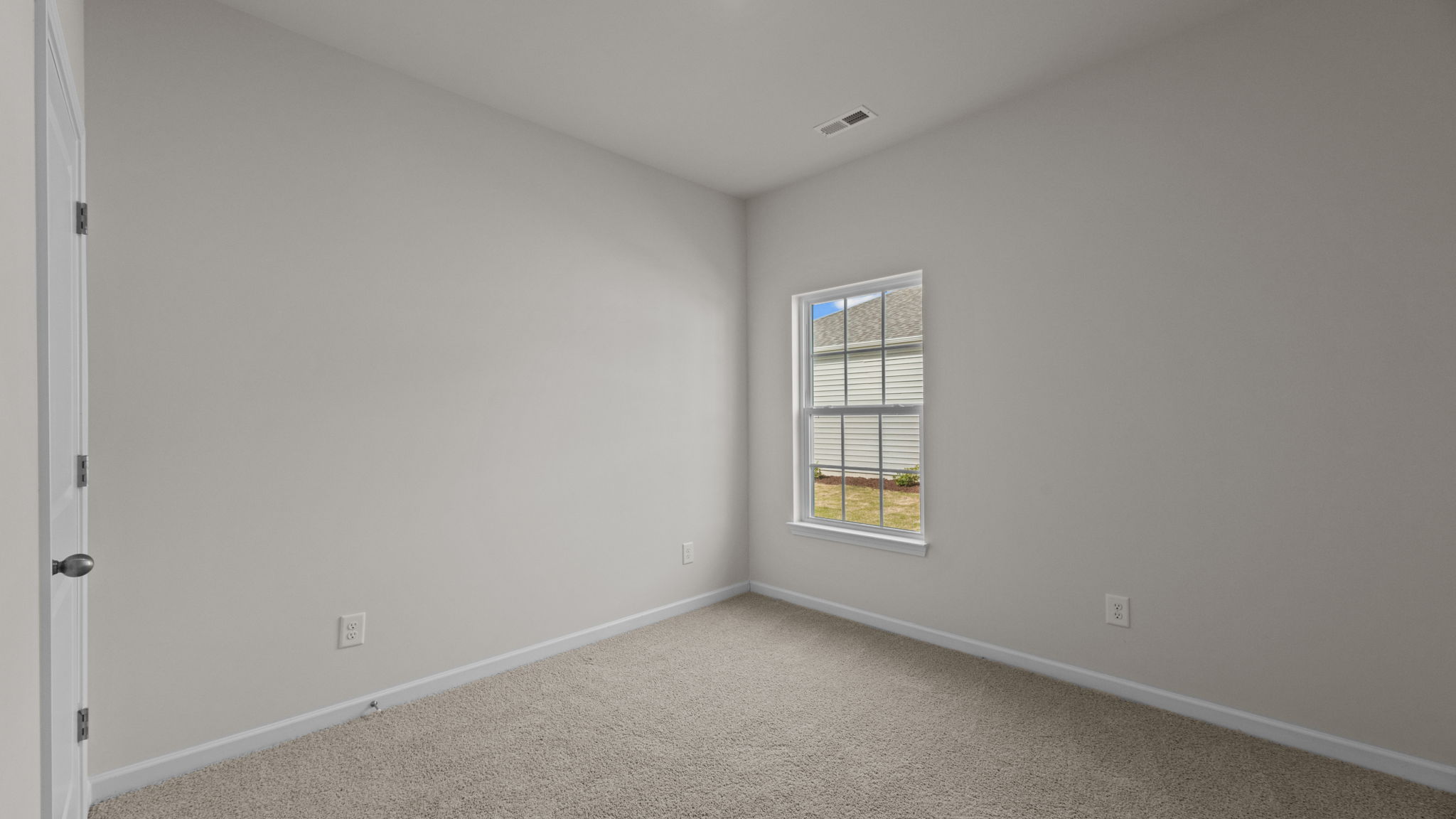 Bedroom with carpet flooring