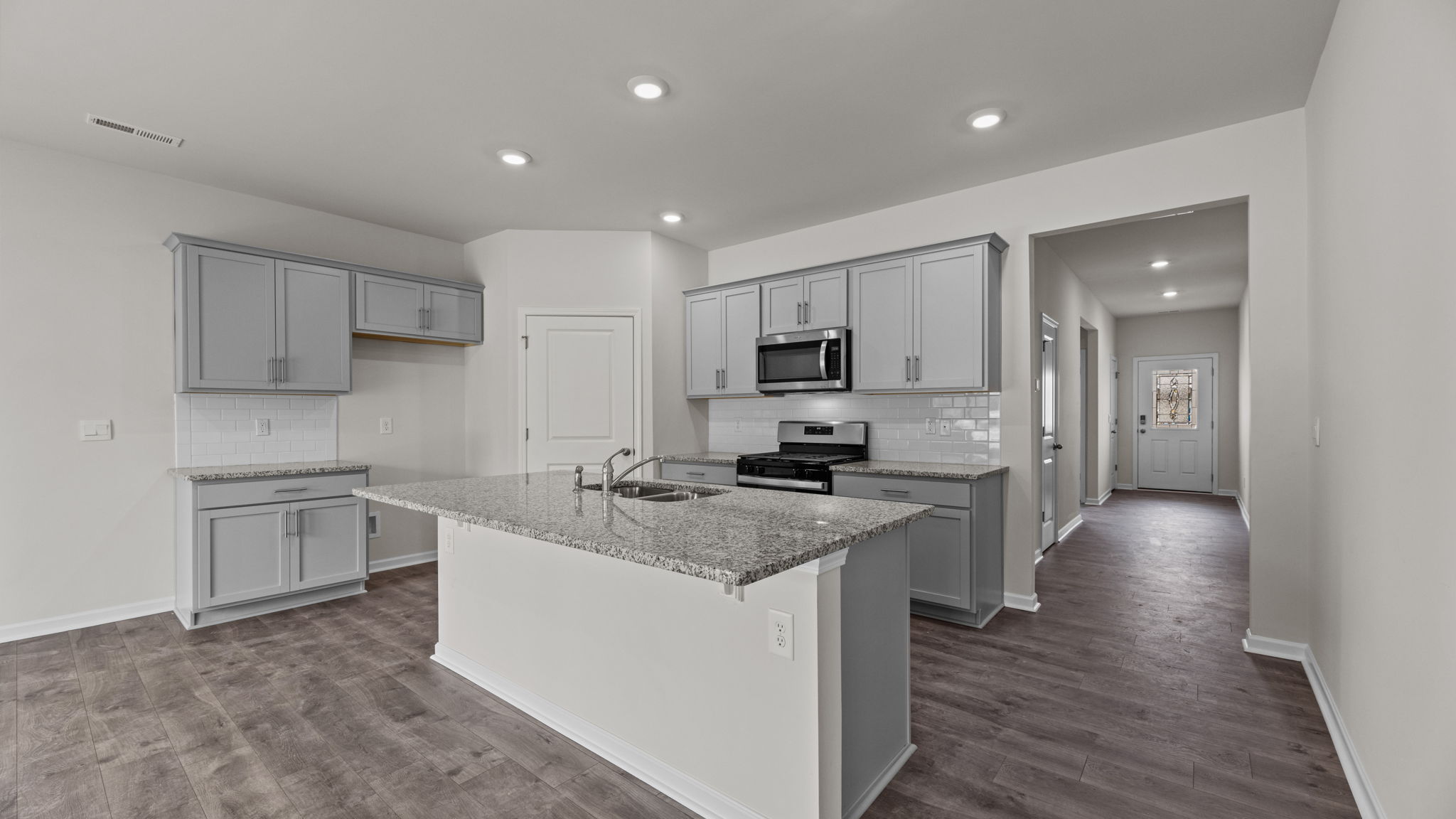 Kitchen with stainless-steel appliances