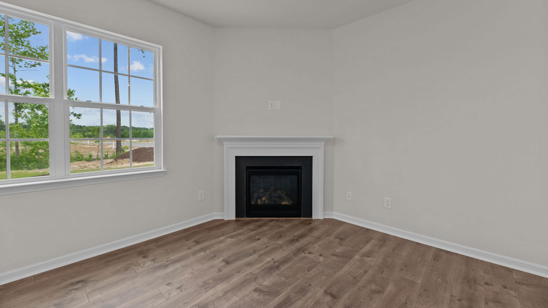 Open-concept living room with fireplace