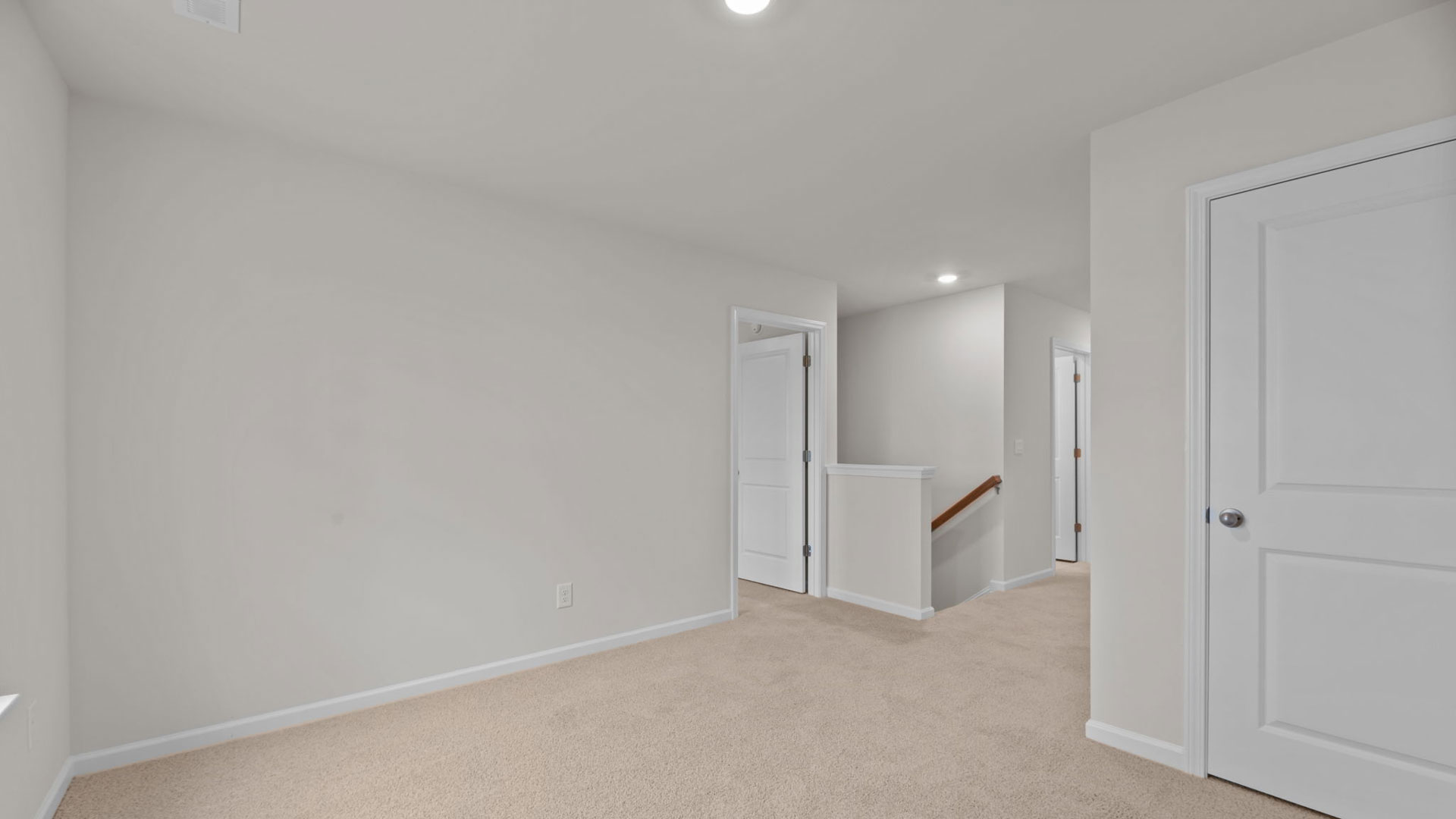 Loft with carpet flooring