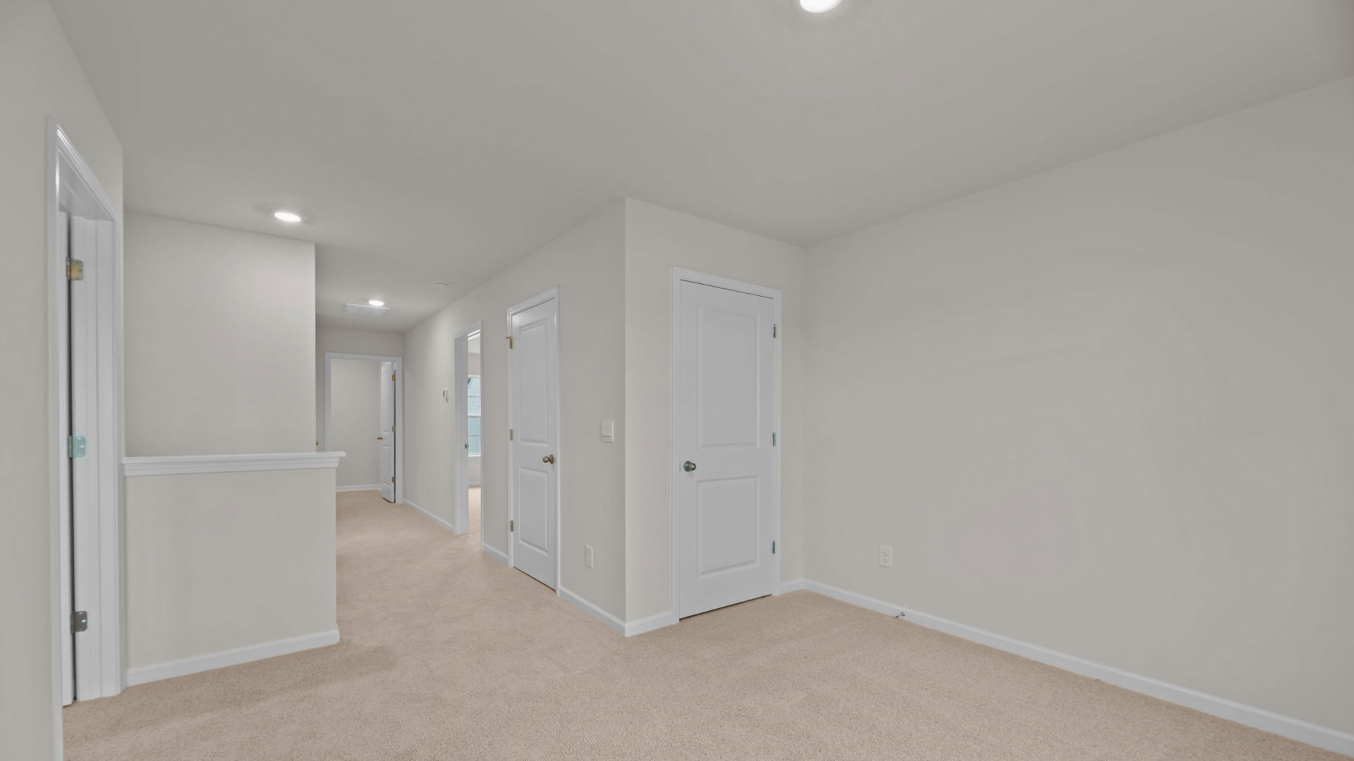 Loft with carpet flooring