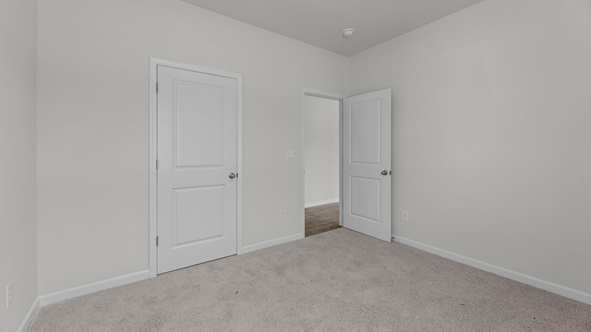 Bedroom with carpet flooring