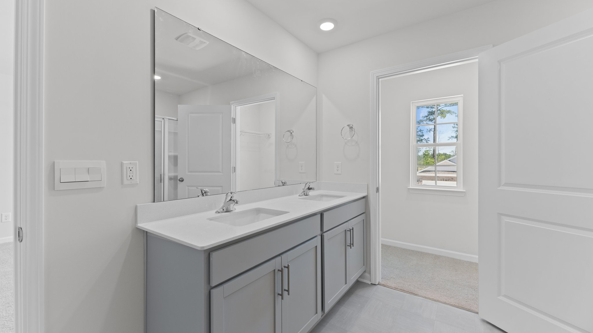 Primary bathroom with quartz counters