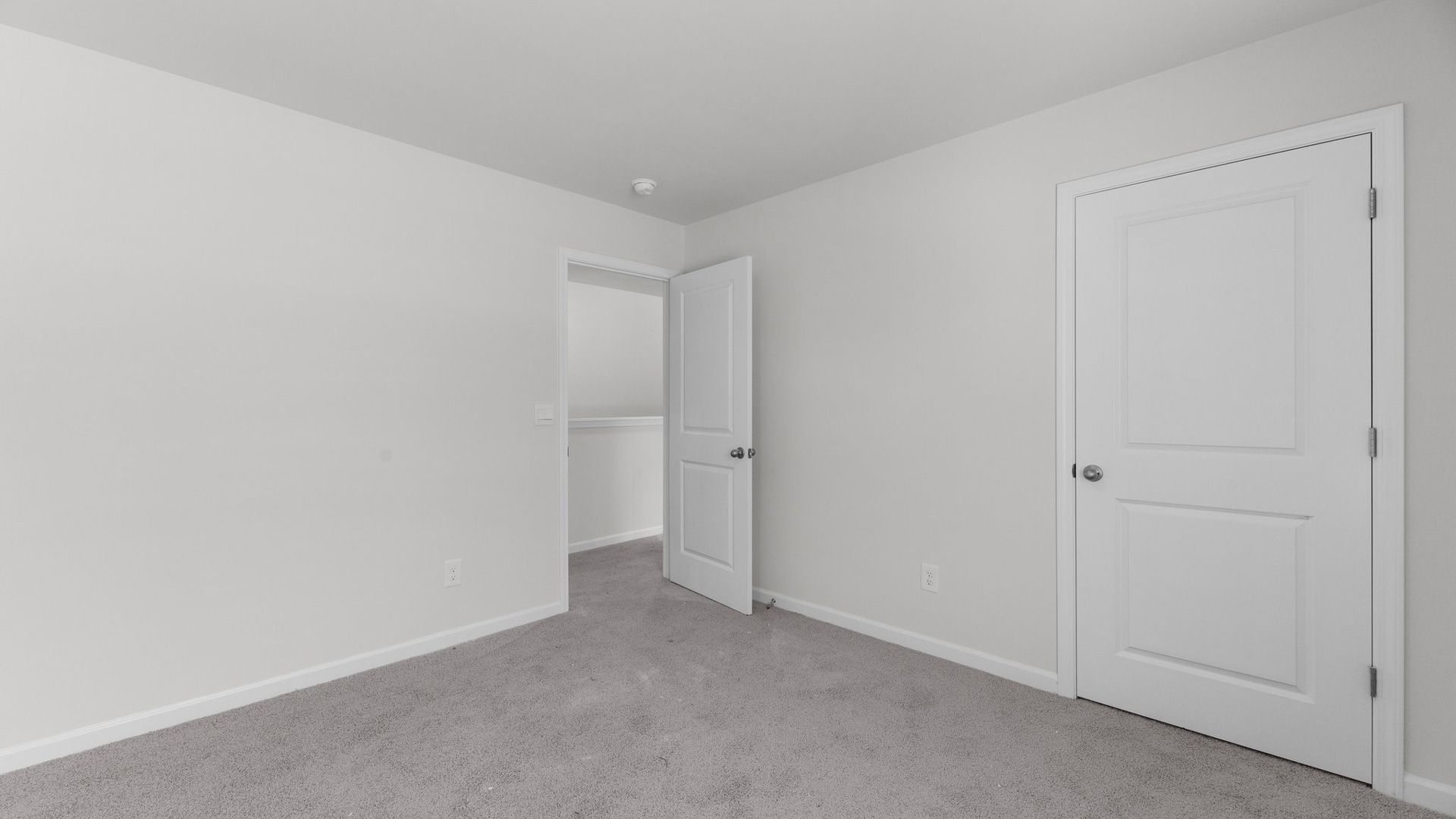 Bedroom with carpet flooring