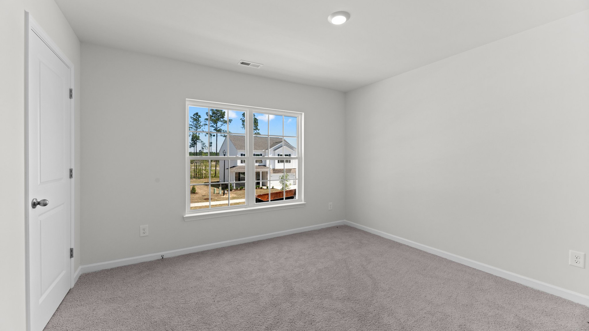 Bedroom with carpet flooring