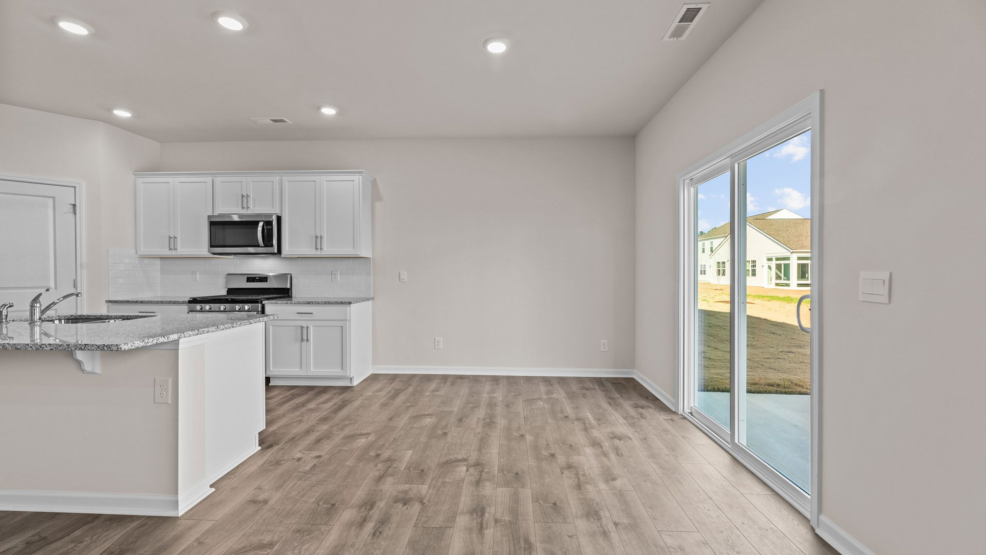 Dining area with revwood flooring