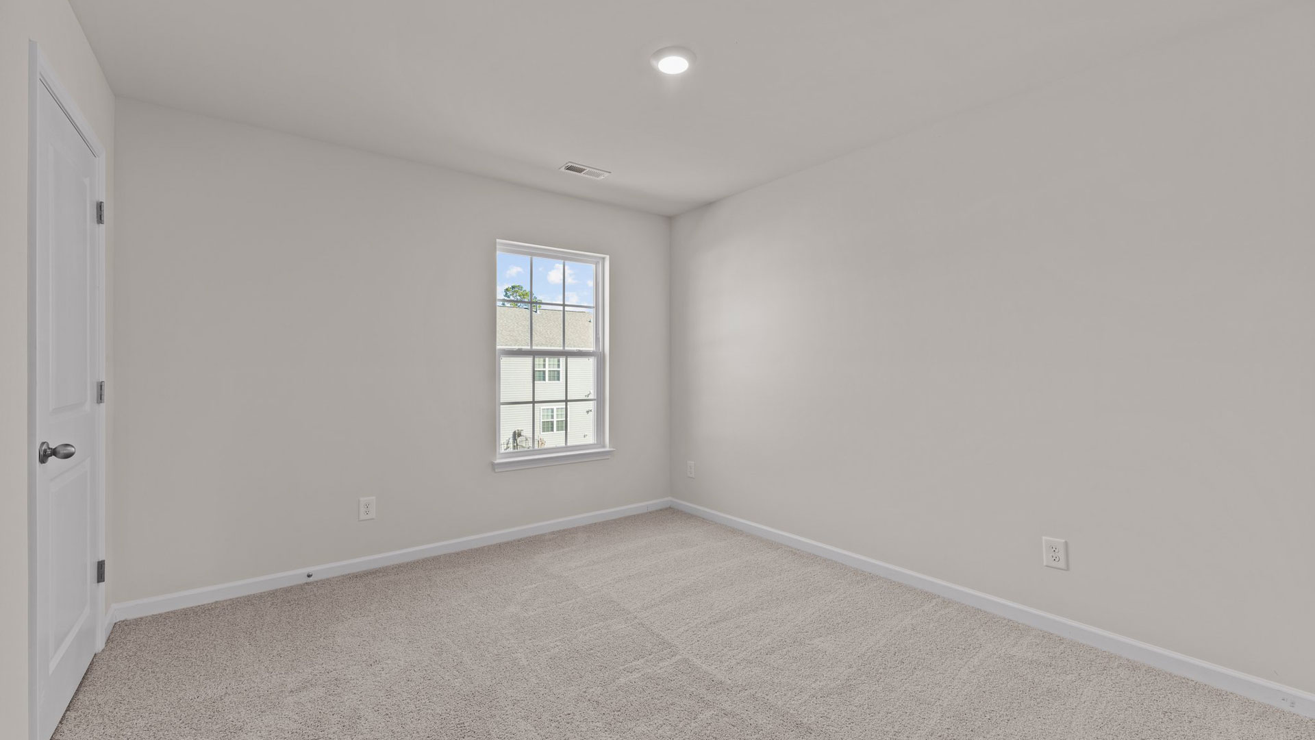 Bedroom with carpet flooring