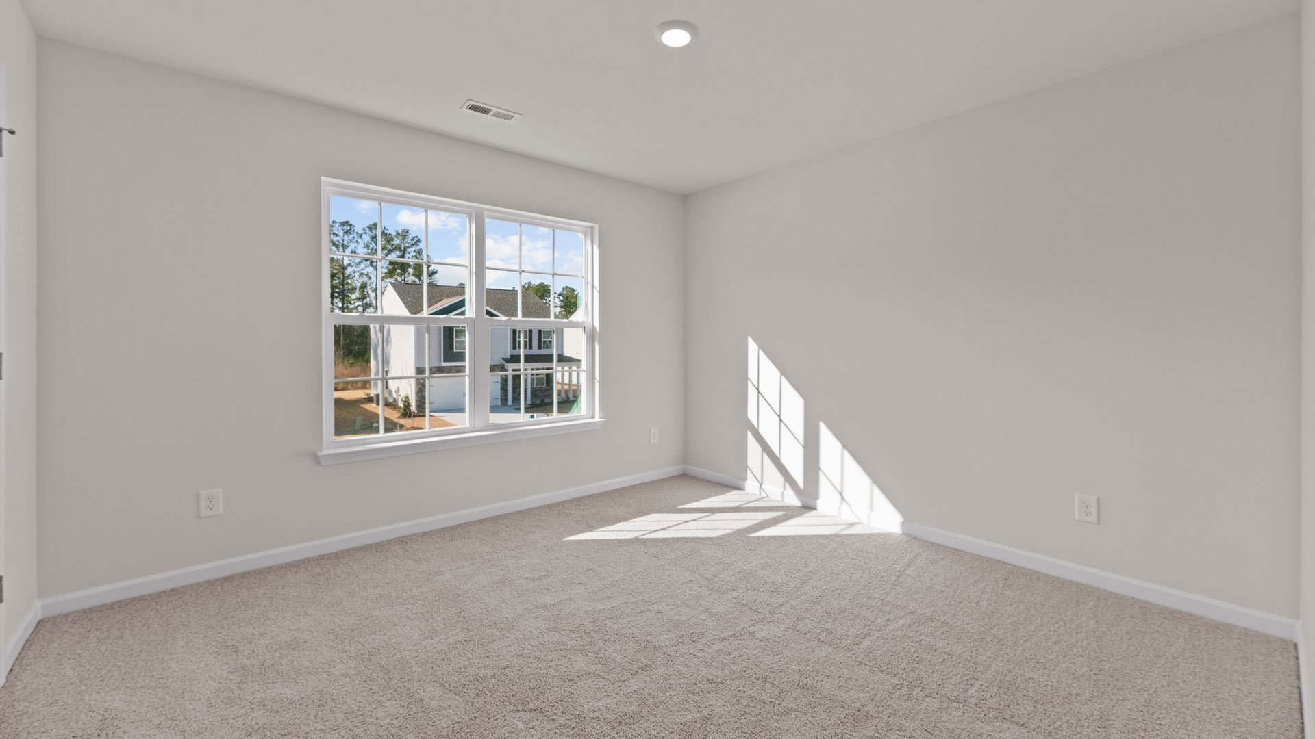 Bedroom with carpet flooring