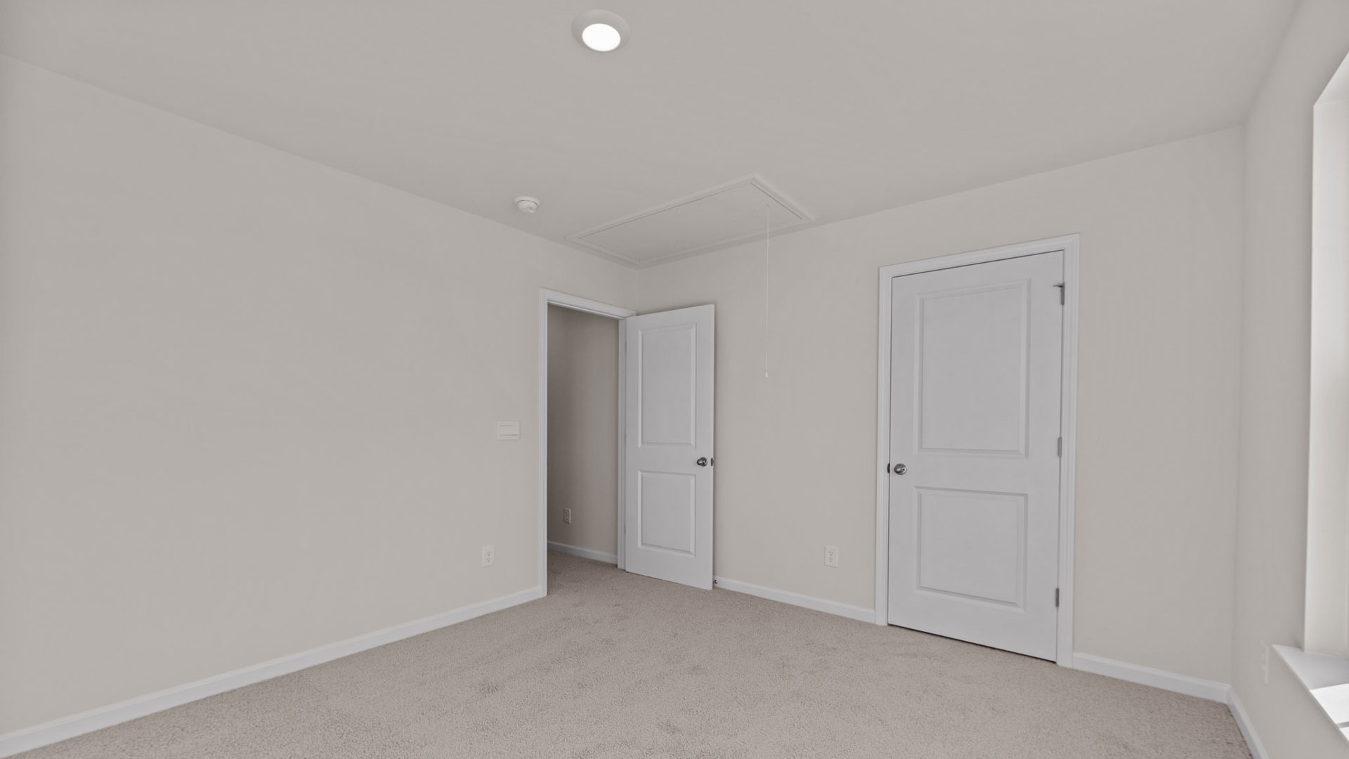 Bedroom with carpet flooring