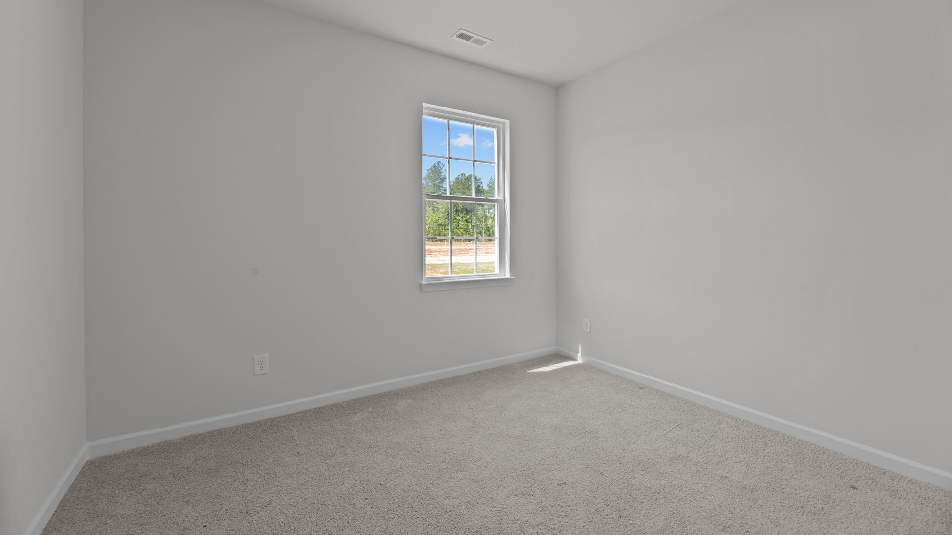 Bedroom with carpet flooring