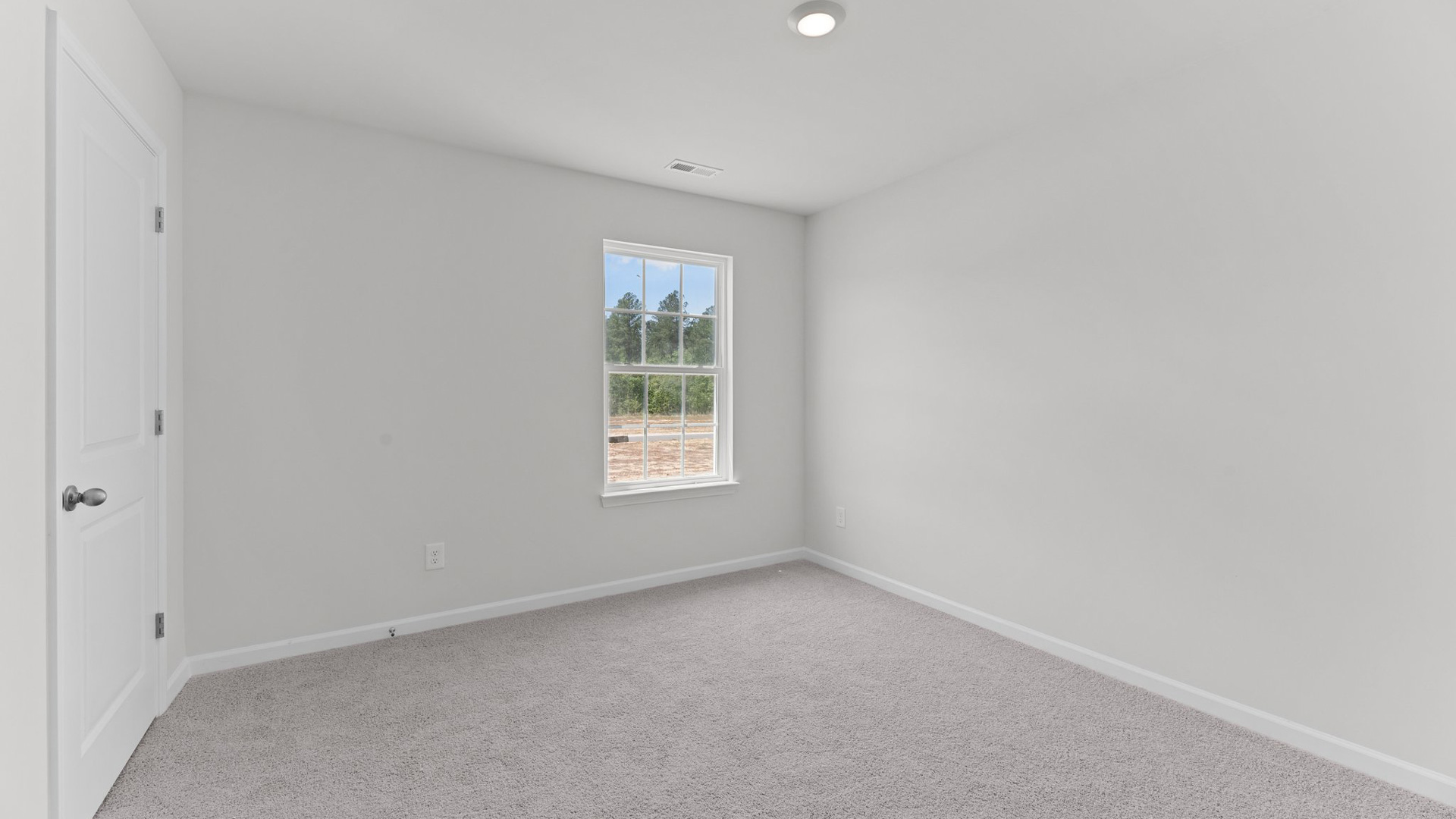 Bedroom with carpet flooring