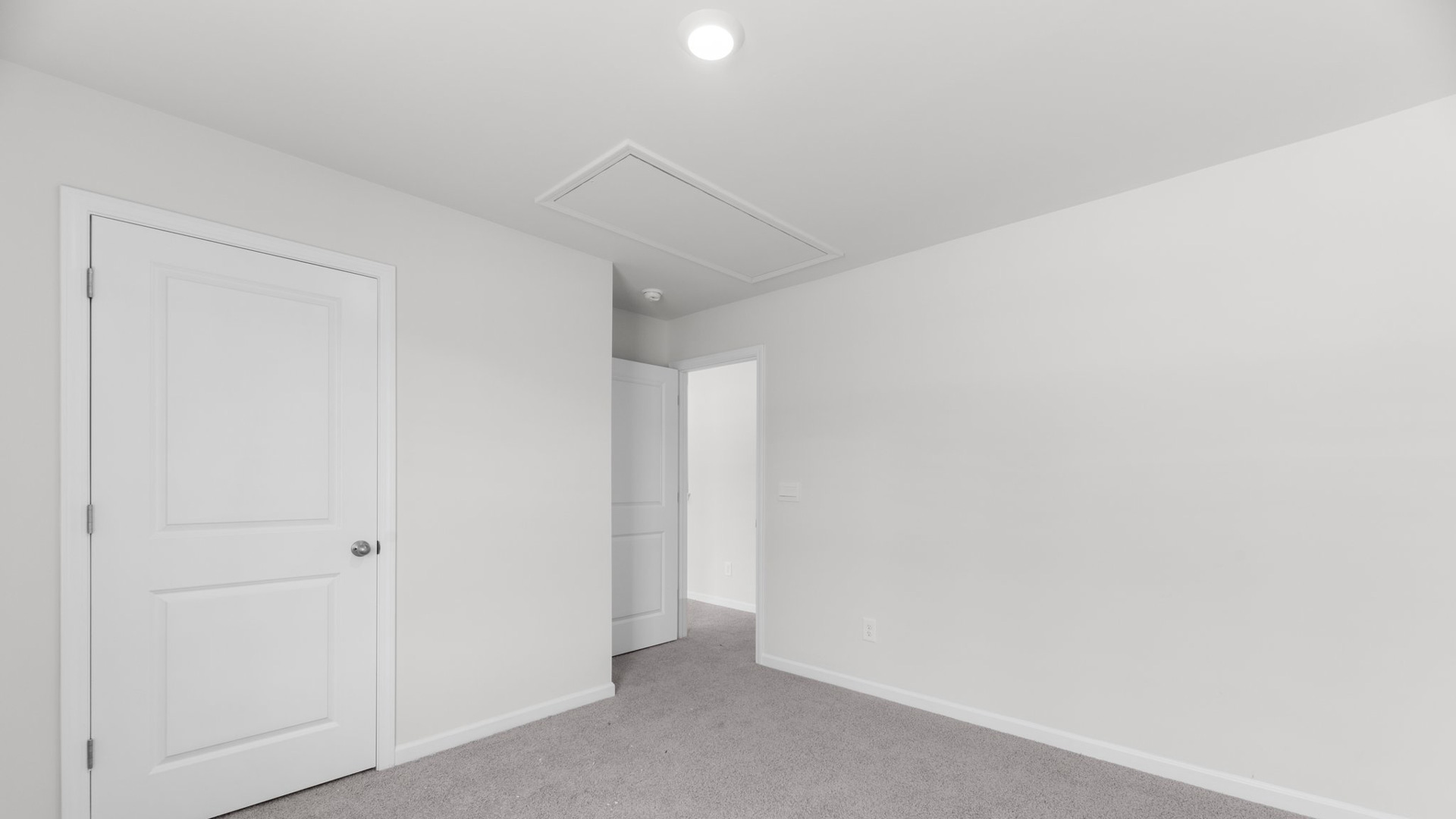 Bedroom with carpet flooring