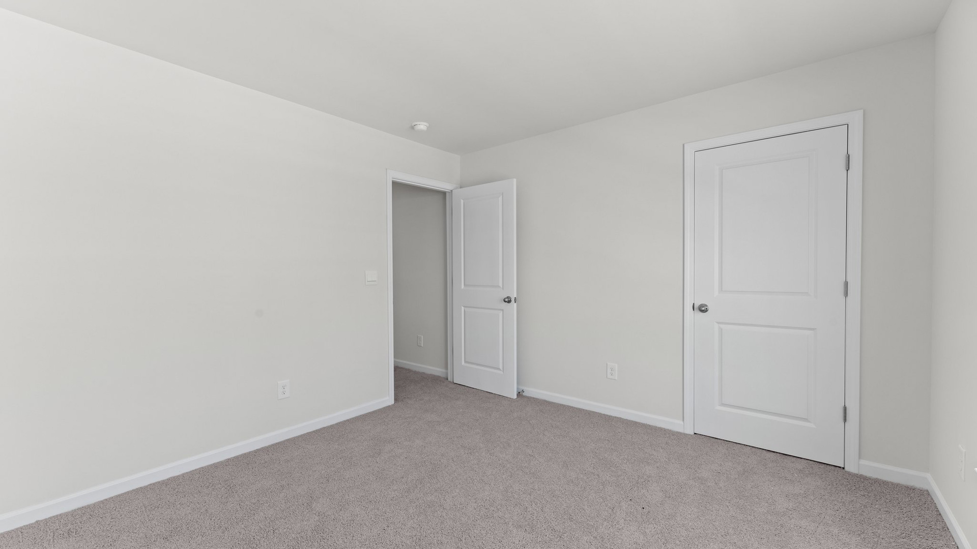 Bedroom with carpet flooring