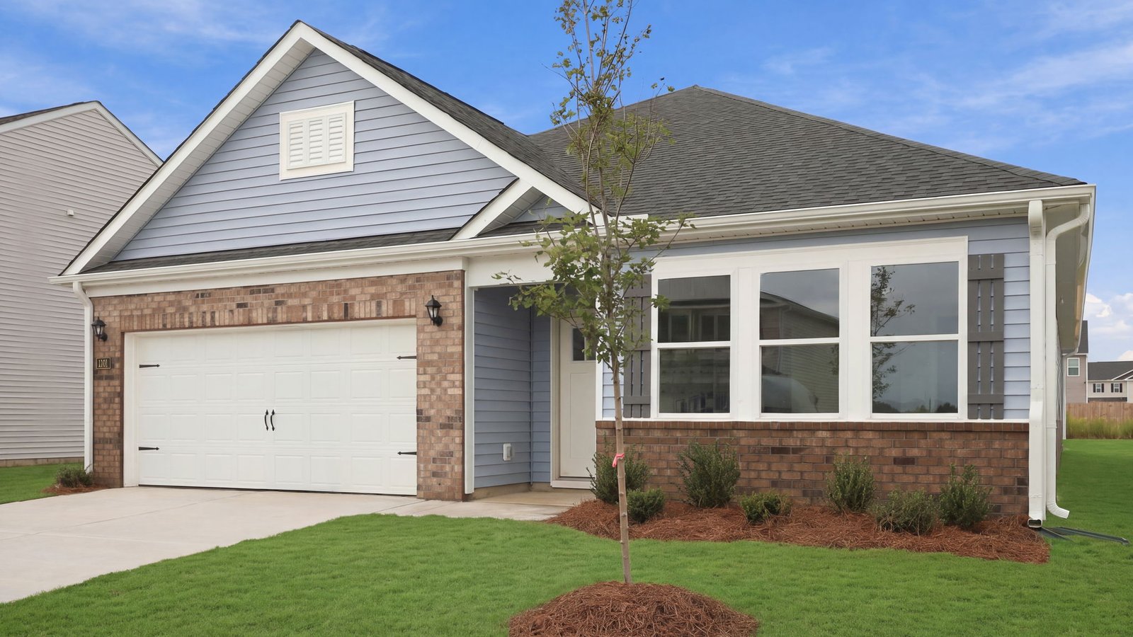 front view of home with two car garage