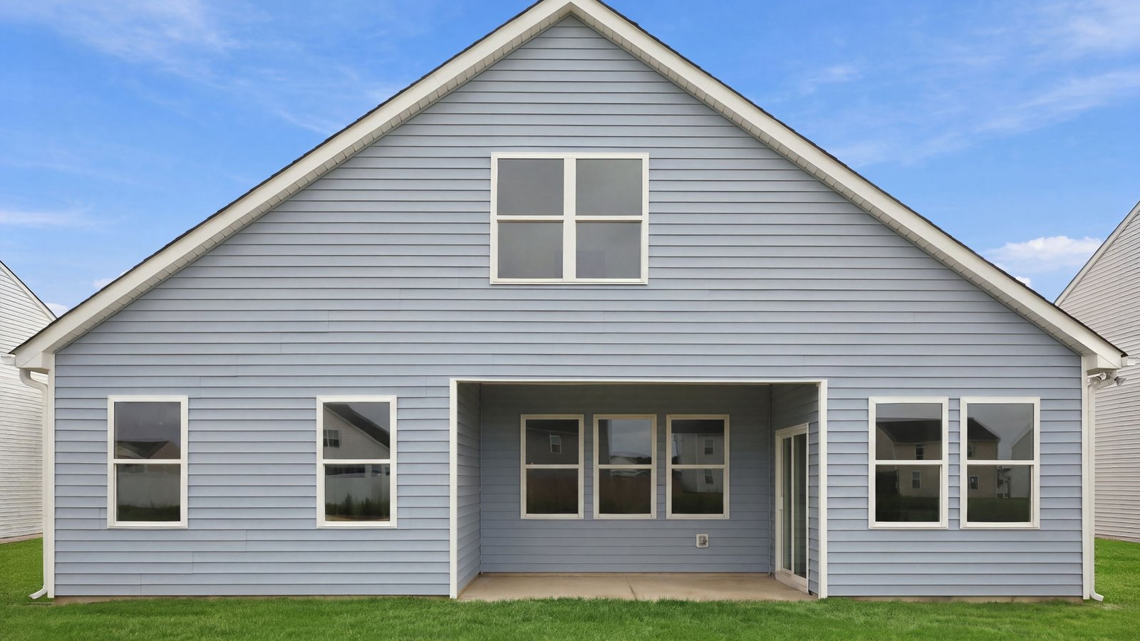 rear view of home and back lot