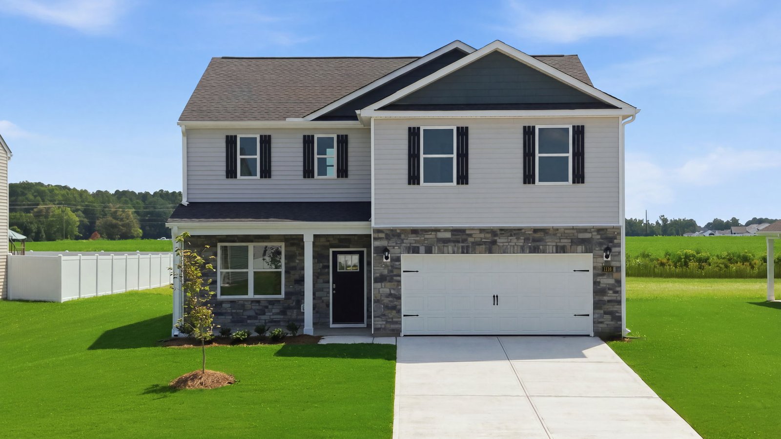 driveway view of two story galen plan