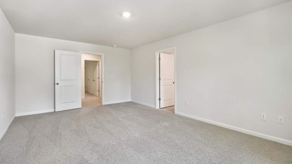 Bedroom with carpet