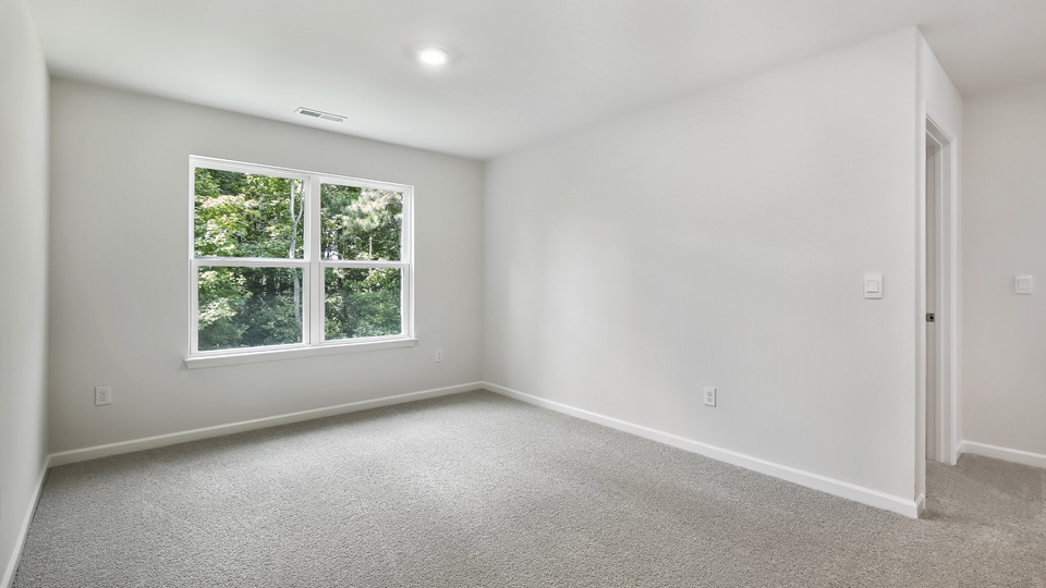 Loft area with carpet