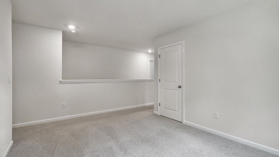 Loft area with carpet