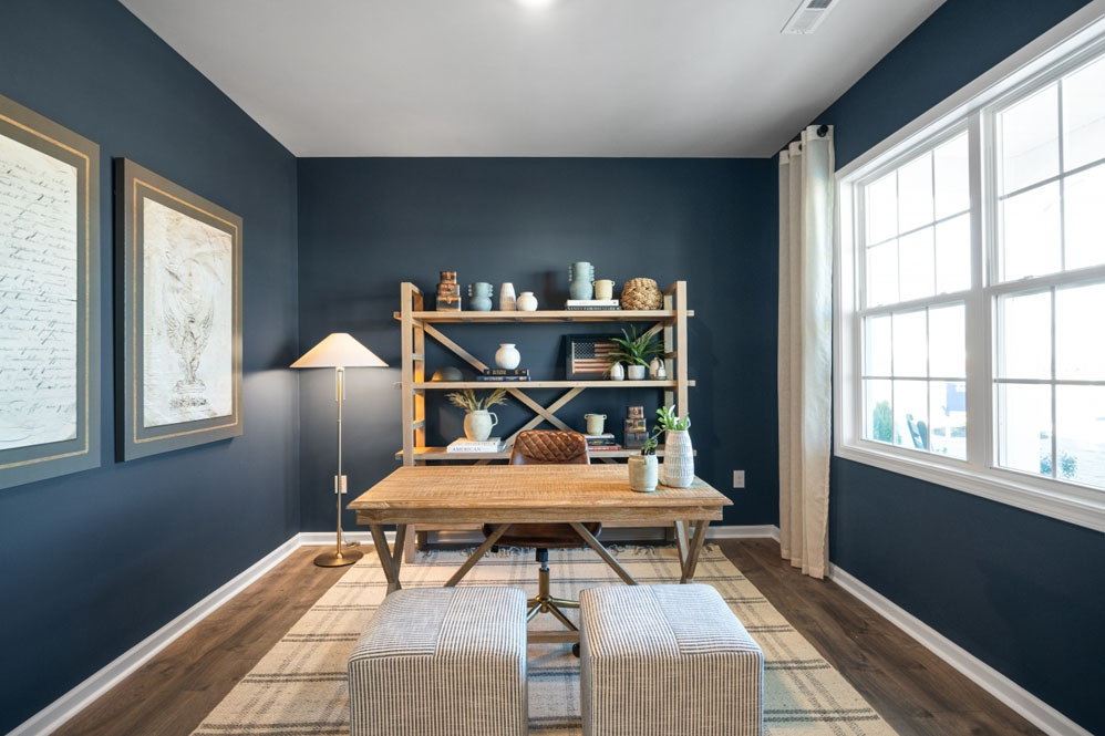 Formal study next to the entrance of the home