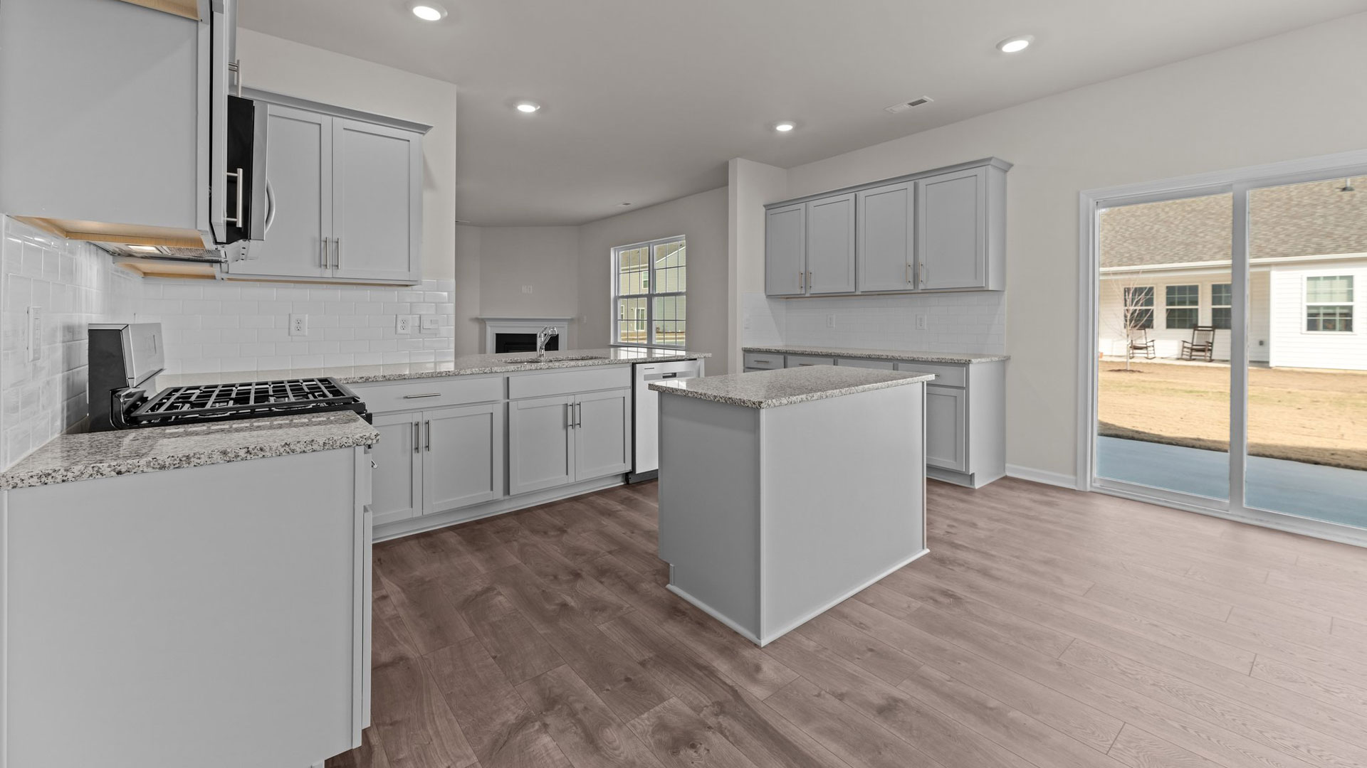 kitchen view with stainless steel appliances and island