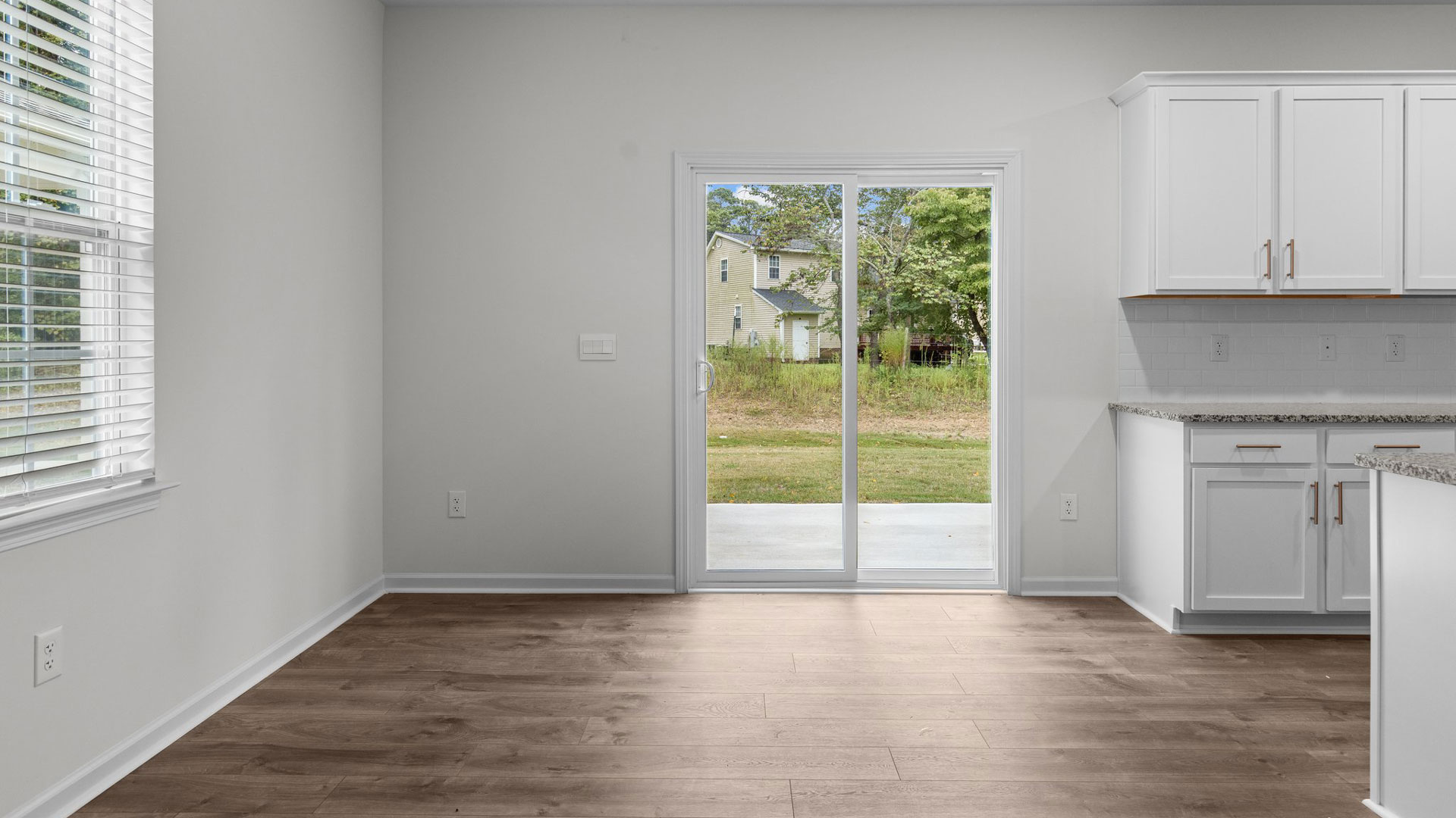 Dining space with view and sliding glass door to back patio