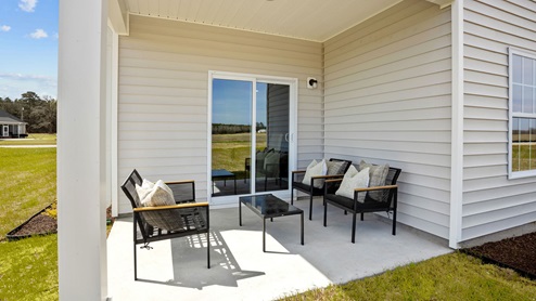 Back yard with a covered patio