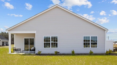 Back yard with a covered patio