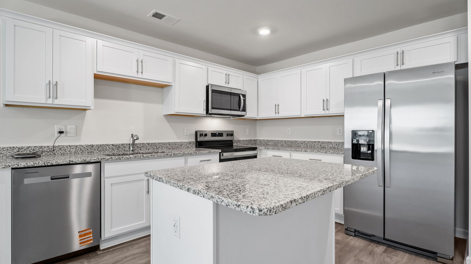 kitchen with white cabinets and stainless steel appliances