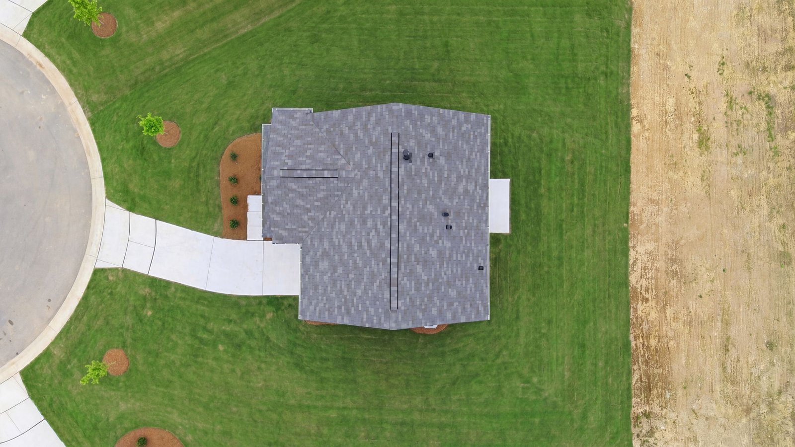 aerial view of the home and yard