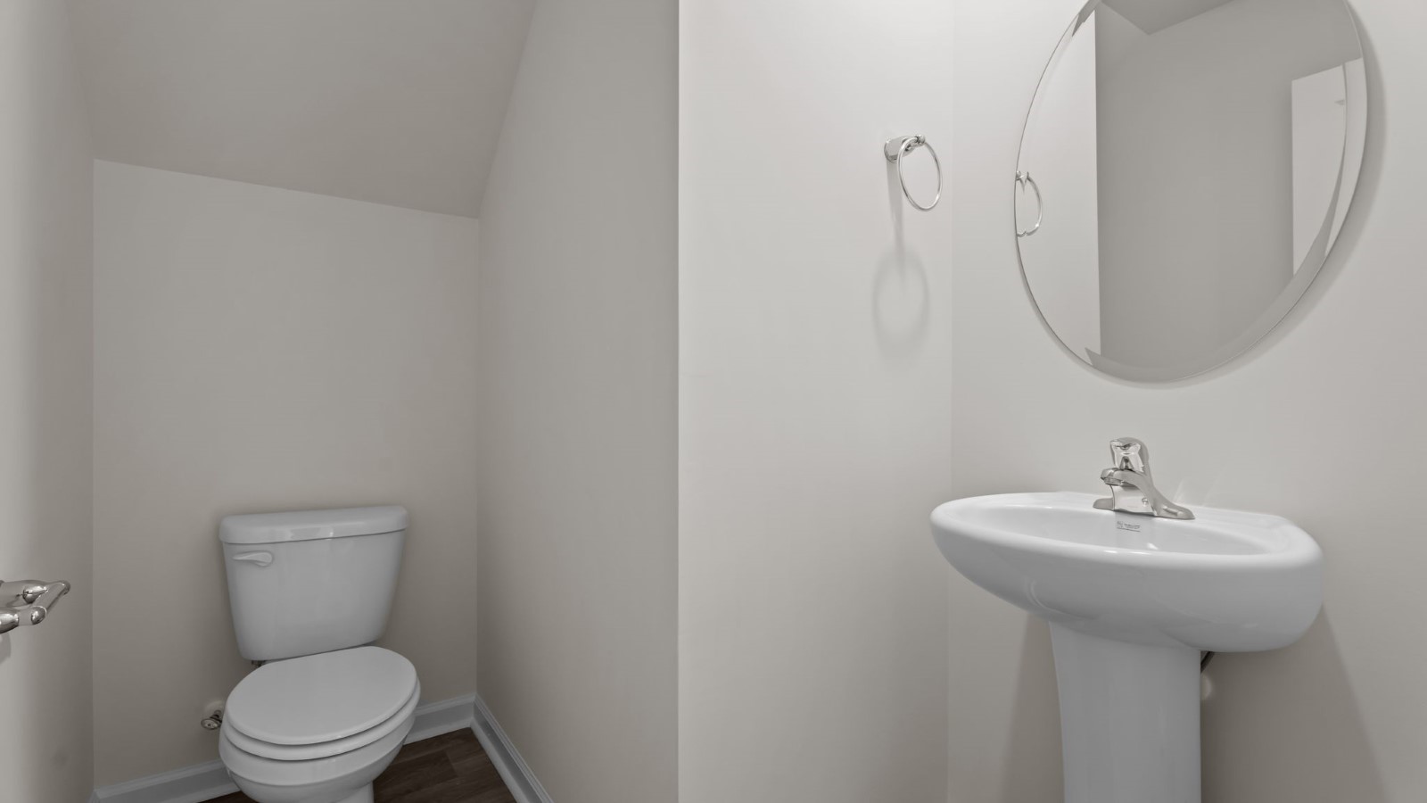 bathroom with white cabinets