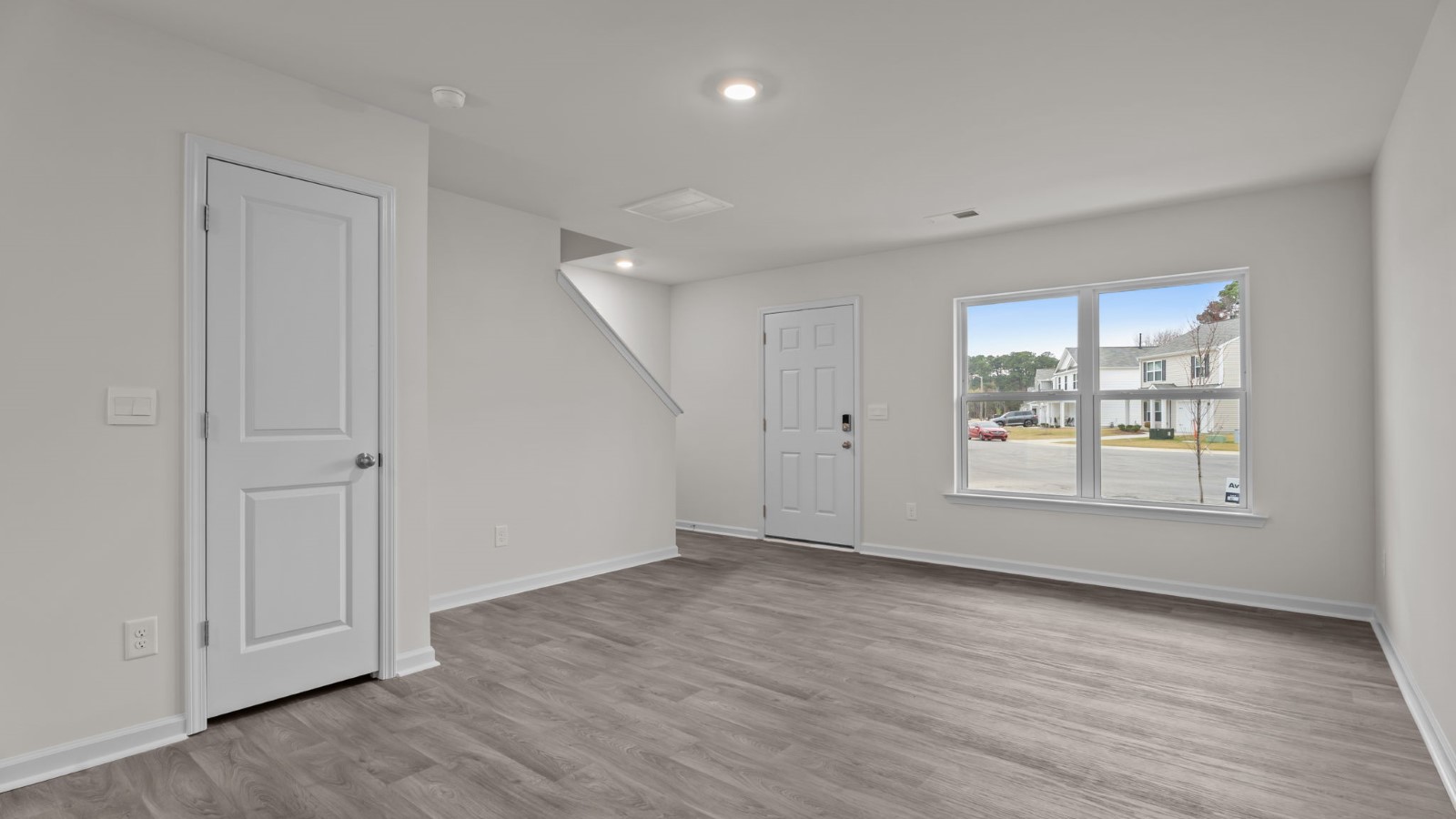 open bedroom space with window views