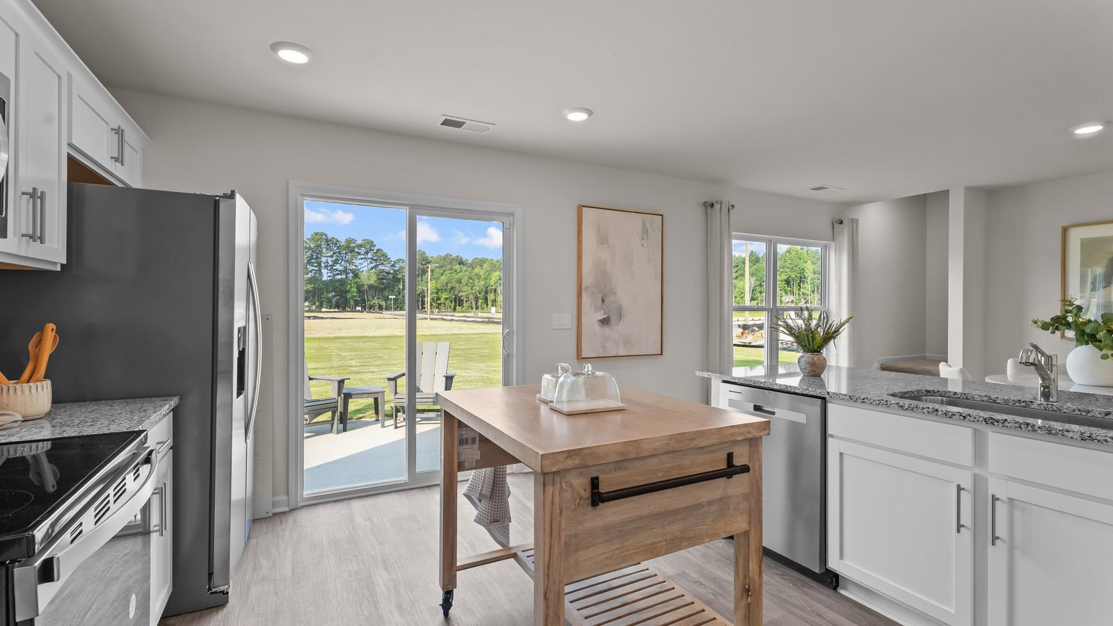 Kitchen and dining area with sliding glass door