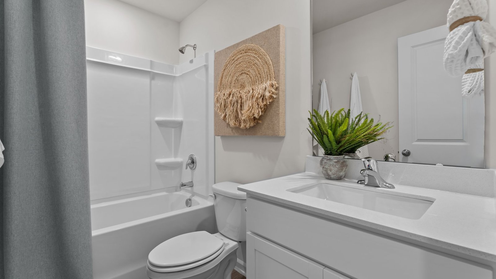Bathroom with white cabinets