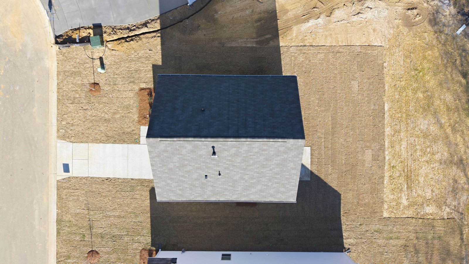 Aerial view of the home and back yard area
