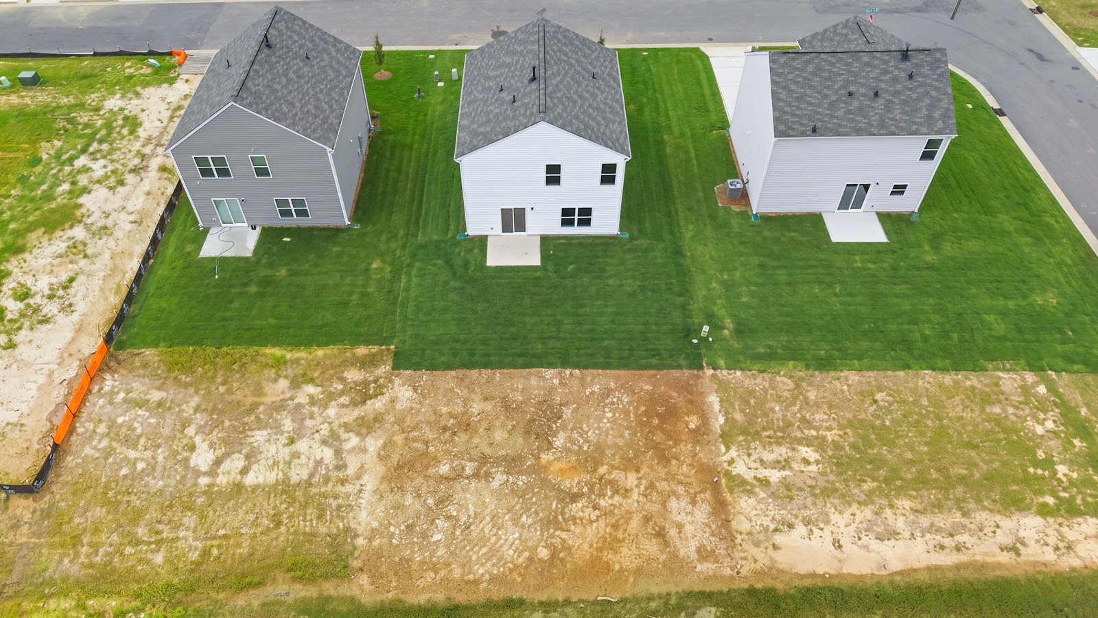 aerial view of home and lot