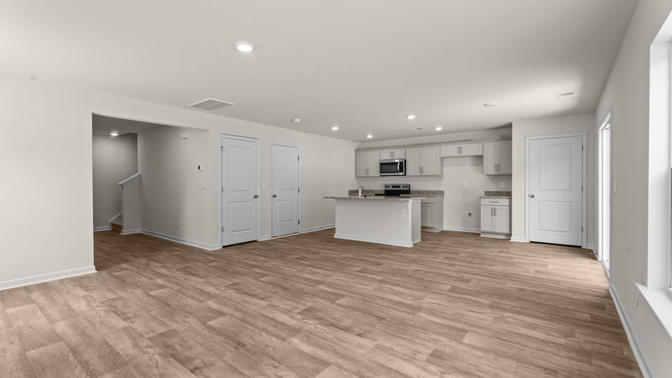 open concept living and kitchen area