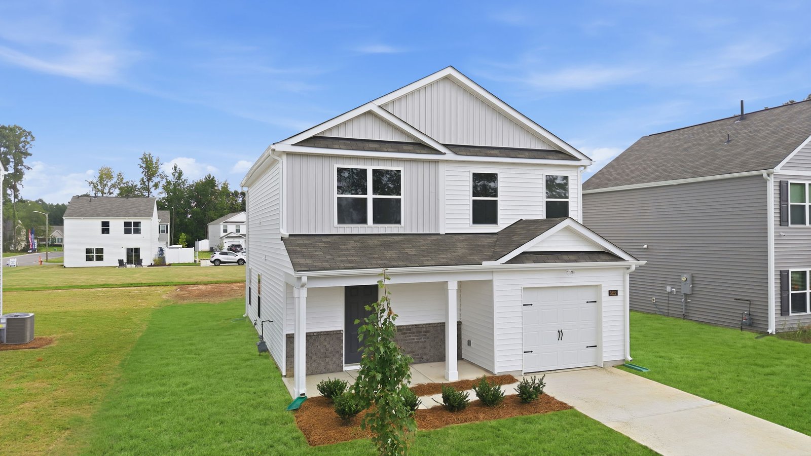 two story home with garage