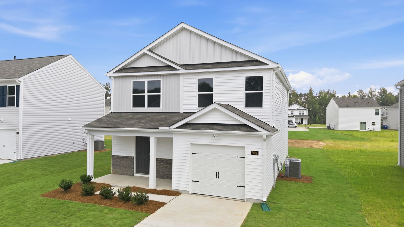 two story home with garage