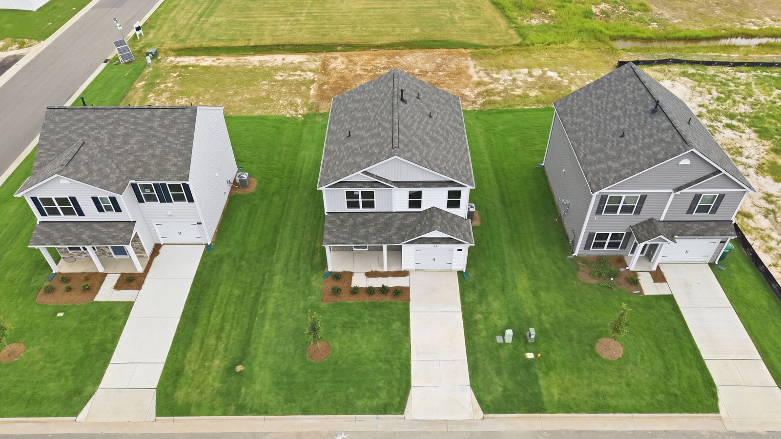 aerial view of home and lot