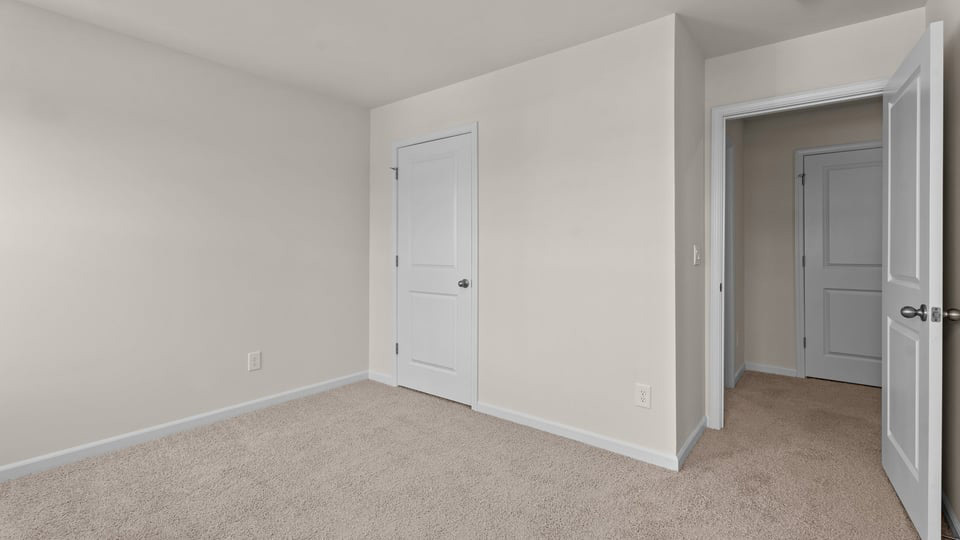 Bedroom with carpet