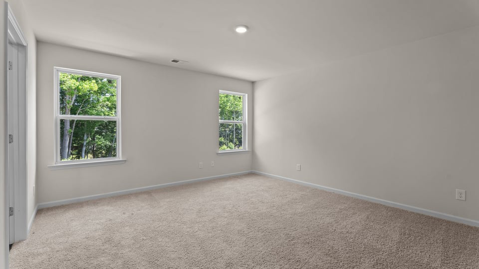 Bedroom with carpet flooring